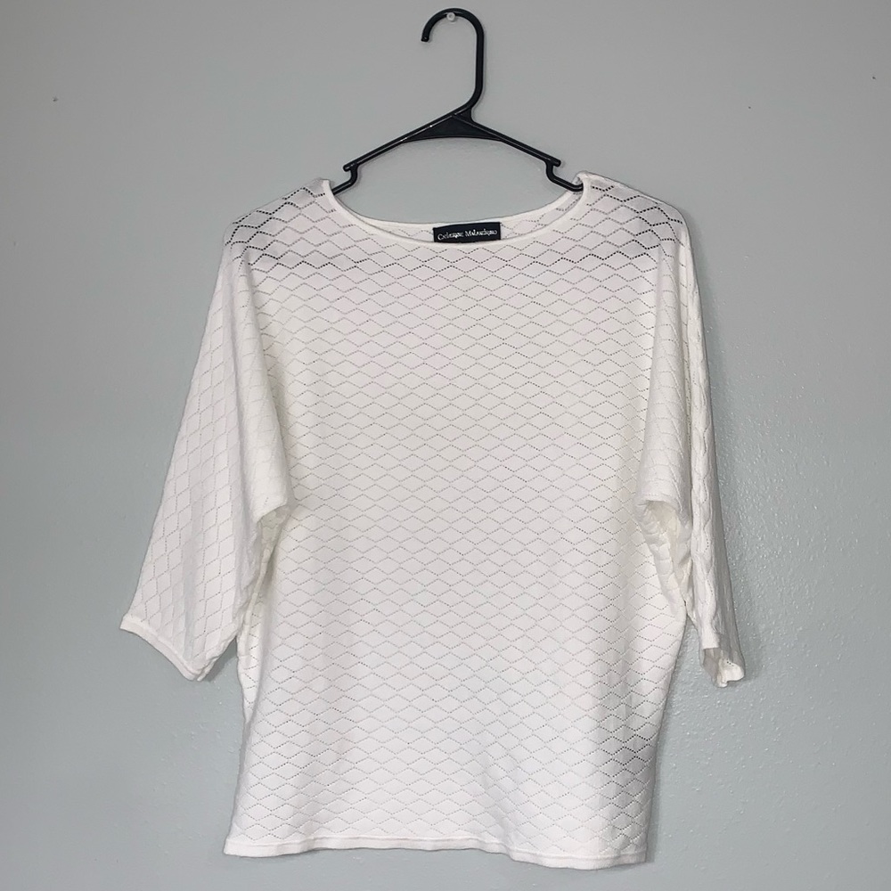 White sweater. Thin, slightly shear material. Size: L
